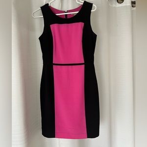 Pink and black color block mini dress.